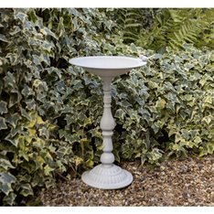 Cream metal Bird bath Image